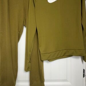 Nike Olive athletic shirt with thumb hole; lightweight and fitted.